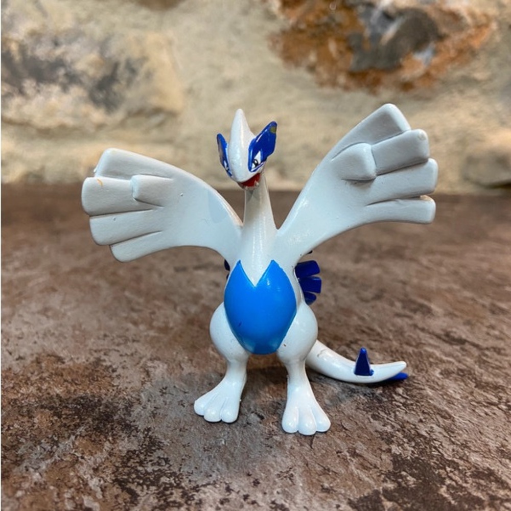 White and Blue Dragon Figure